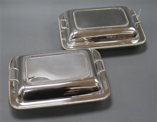 A pair of Asprey & Co silver plated entree dishes